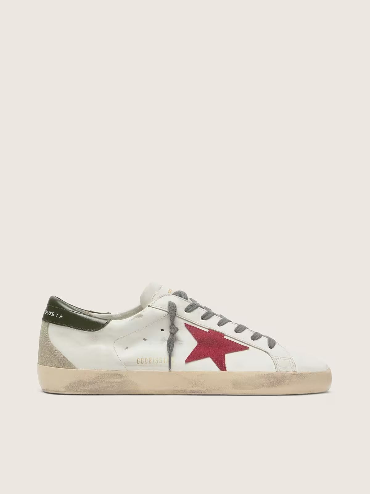 Super-Star com estrela de suede vermelho e talão de couro verde
