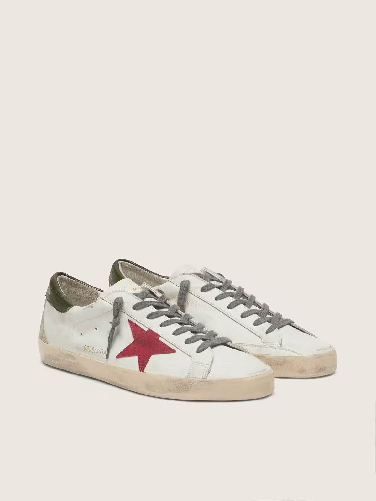 Super-Star com estrela de suede vermelho e talão de couro verde