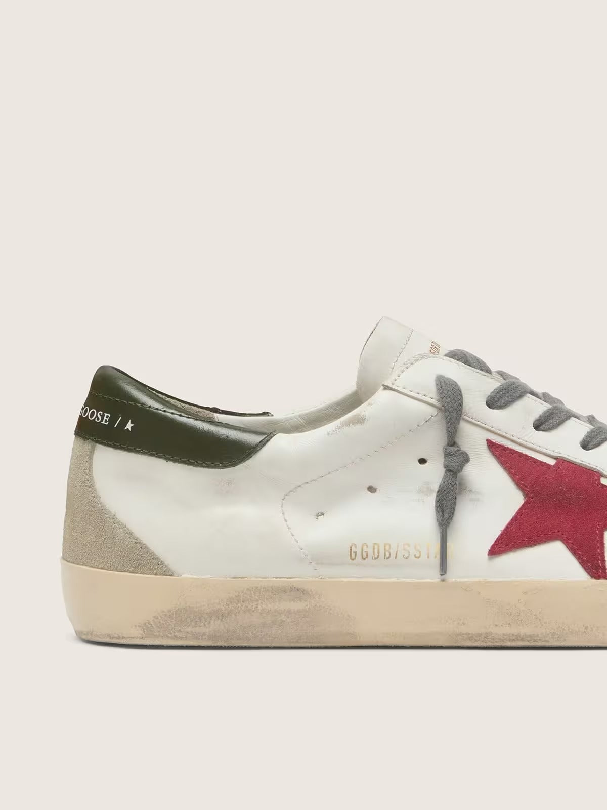 Super-Star com estrela de suede vermelho e talão de couro verde